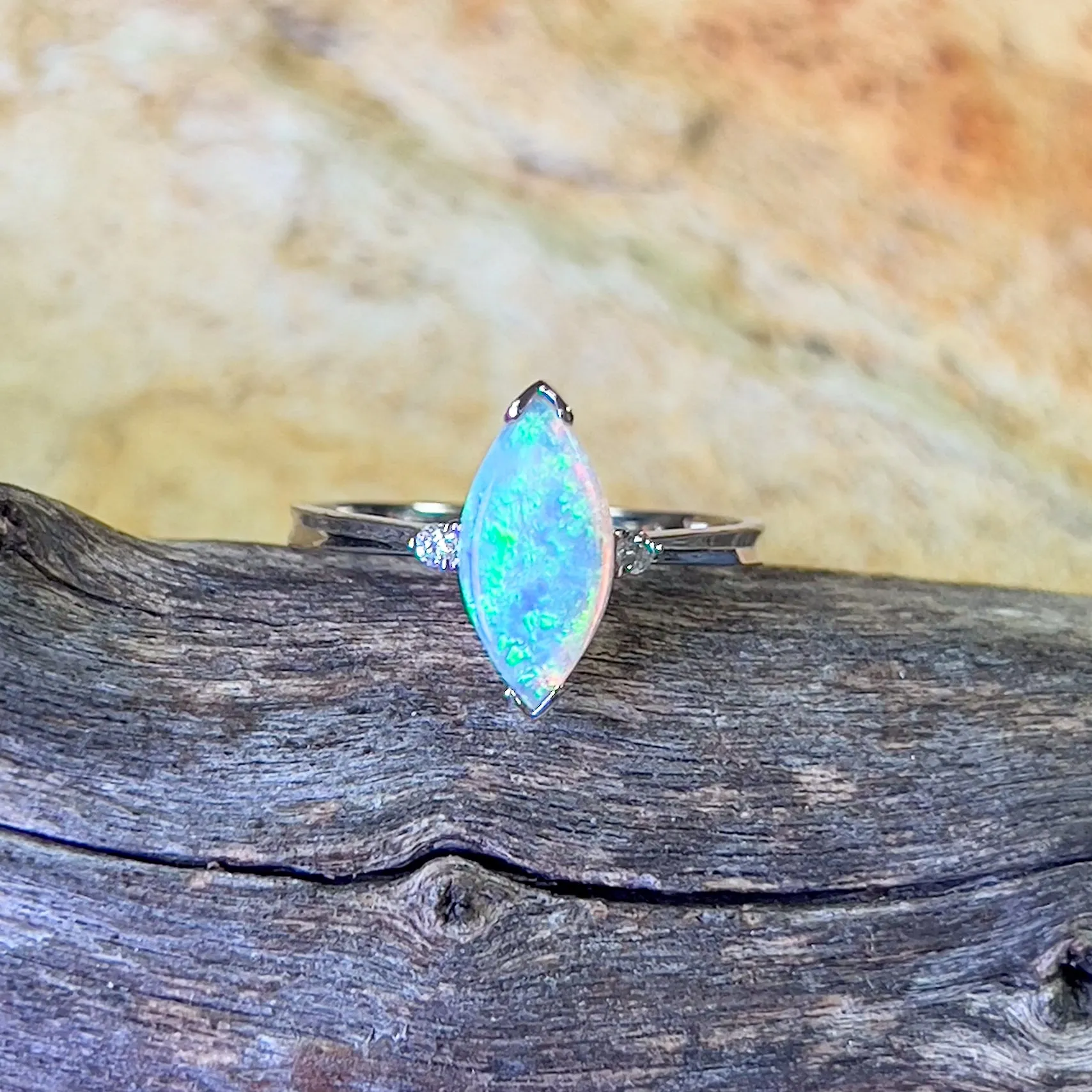 18kt White Gold Marquise Crystal Opal and diamond ring