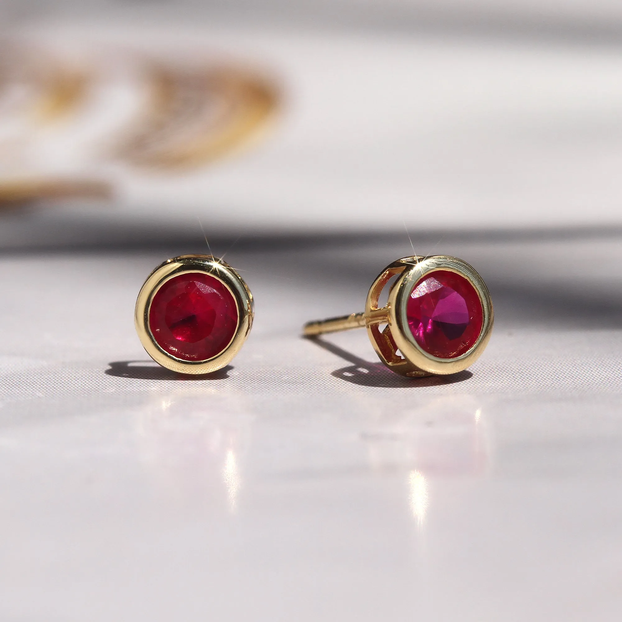 Comfortable & Stylish Hypoallergenic: Gold Ruby Bezel Earrings