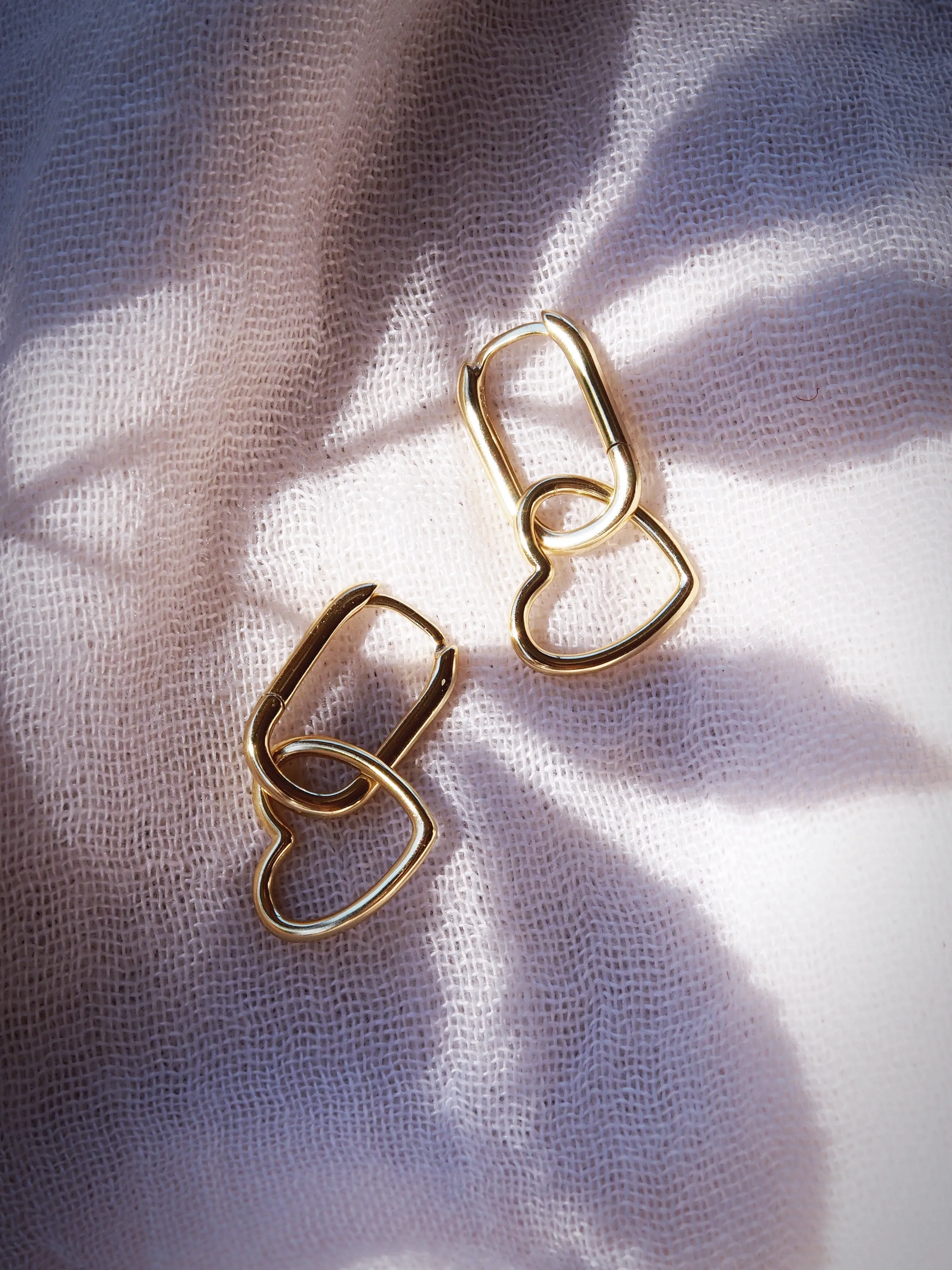 Elongated Dangling Heart Huggie Hoop Earrings - Pu’uwai