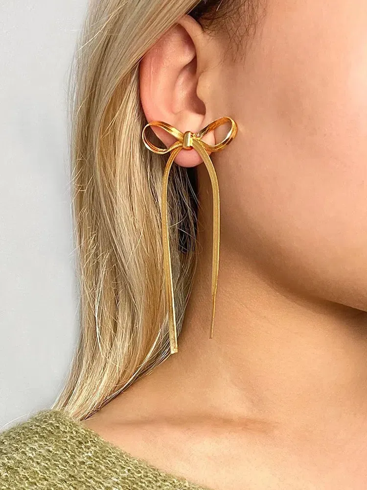 Sabella – Bow accents – Snake chain earrings