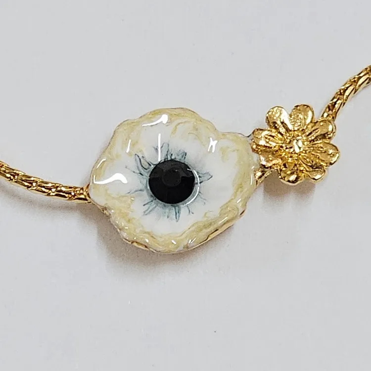 TARATATA ENAMELLED JEWELLERY GOLD WITH WHITE FLOWER