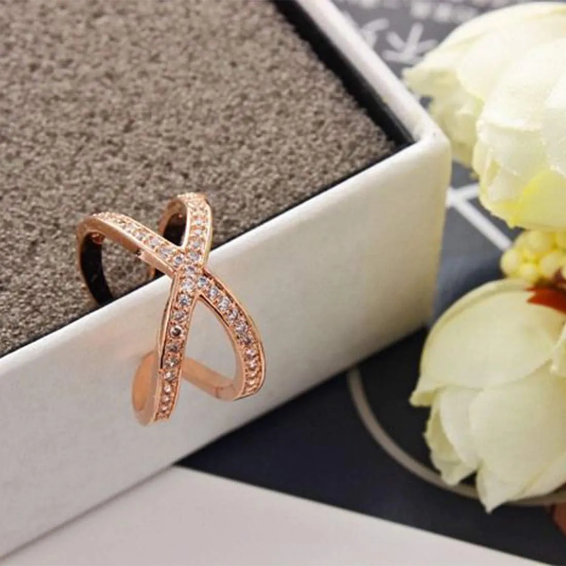 Yellow Chimes Exclusive Italian Design Luxurious Criss Cross Studded Cubic Zirconia Rose Gold Plated Stylish Rings for Women and Girl's(Adjustable)